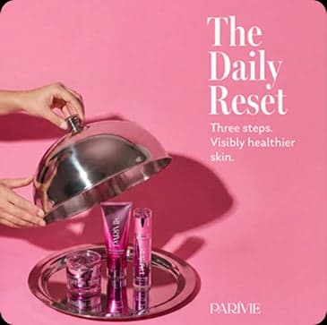 Parivie ad — The Daily Reset skincare set served on a silver tray
