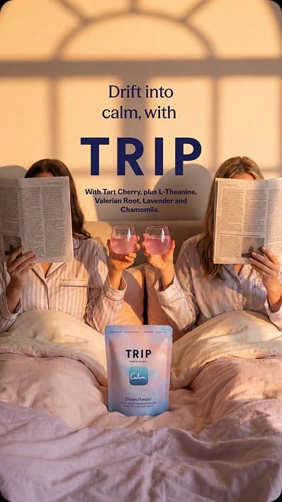 TRIP ad — two women reading magazines over drinks